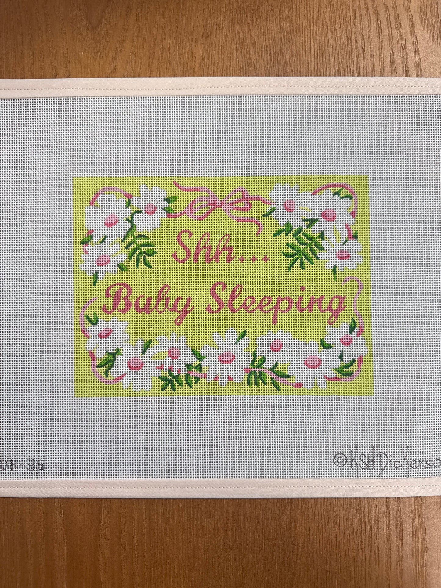Baby Sleeping With Bows and Daisies