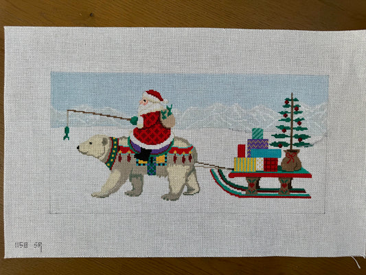 Santa Riding a Polar Bear with Sled