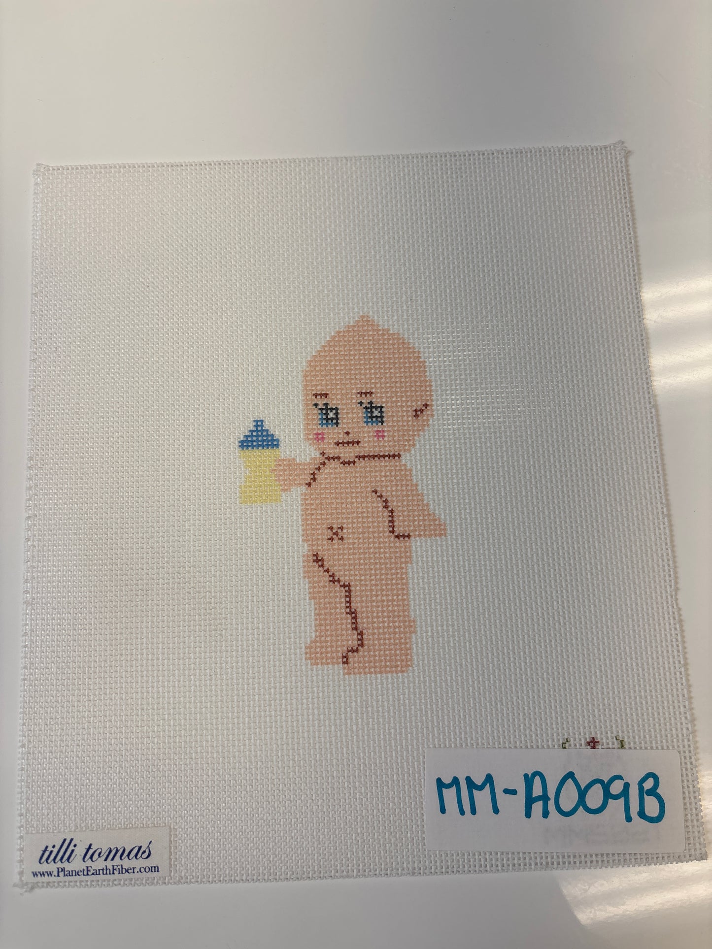MM-A009B Kewpie with Blue Bottle - Trunk Show