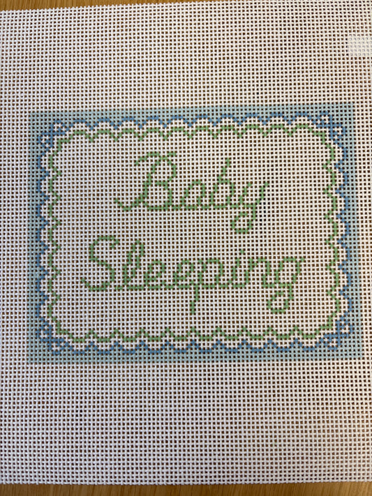 Baby Sleeping with Blue Bows