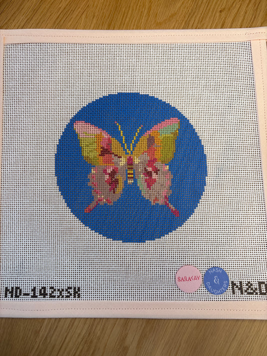 Gold and Green Butterfly on Blue